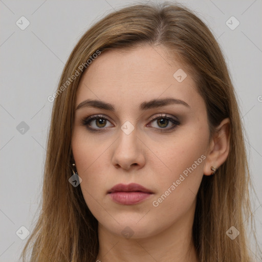 Neutral white young-adult female with long  brown hair and brown eyes