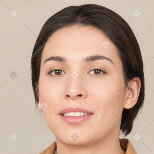 Joyful white young-adult female with medium  brown hair and brown eyes