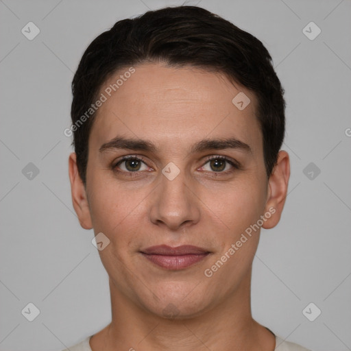 Joyful white young-adult male with short  black hair and brown eyes