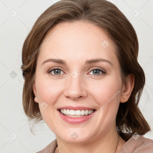 Joyful white young-adult female with medium  brown hair and blue eyes