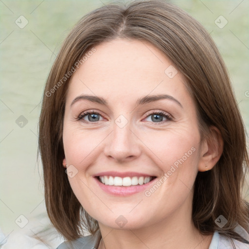 Joyful white young-adult female with medium  brown hair and green eyes