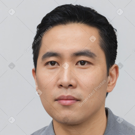 Neutral asian young-adult male with short  black hair and brown eyes