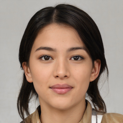 Neutral latino young-adult female with medium  brown hair and brown eyes