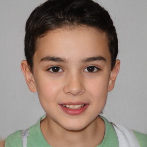 Joyful white child female with short  brown hair and brown eyes