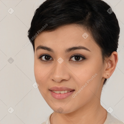 Joyful latino young-adult female with short  brown hair and brown eyes