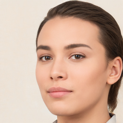 Neutral white young-adult female with medium  brown hair and brown eyes