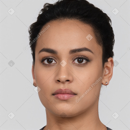 Neutral latino young-adult female with short  black hair and brown eyes