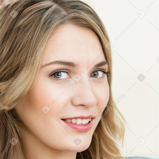 Joyful white young-adult female with long  brown hair and blue eyes