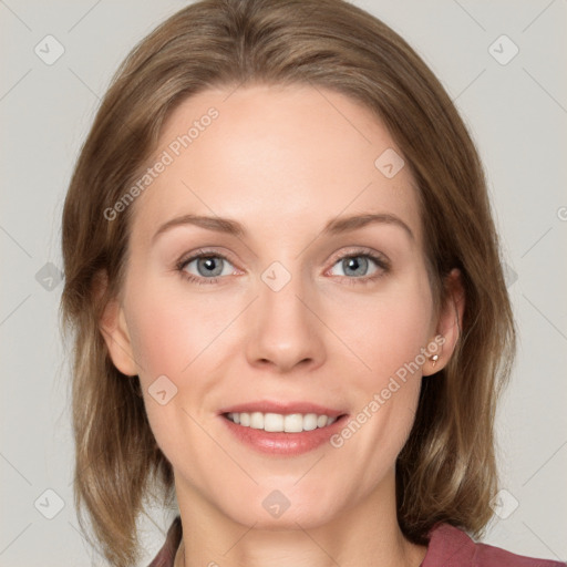 Joyful white young-adult female with medium  brown hair and blue eyes