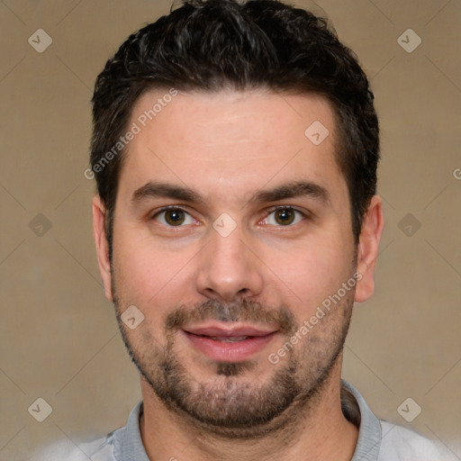 Joyful white young-adult male with short  black hair and brown eyes