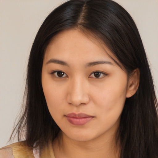 Neutral latino young-adult female with long  brown hair and brown eyes