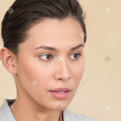 Neutral white young-adult female with medium  brown hair and brown eyes