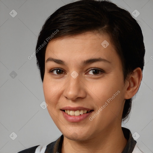 Joyful white young-adult female with short  brown hair and brown eyes