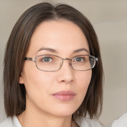 Neutral white young-adult female with medium  brown hair and brown eyes