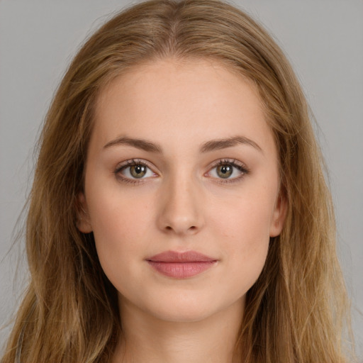 Neutral white young-adult female with long  brown hair and brown eyes