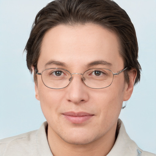 Joyful white adult female with short  brown hair and grey eyes