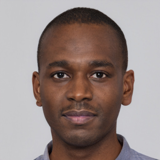 Neutral black young-adult male with short  brown hair and brown eyes
