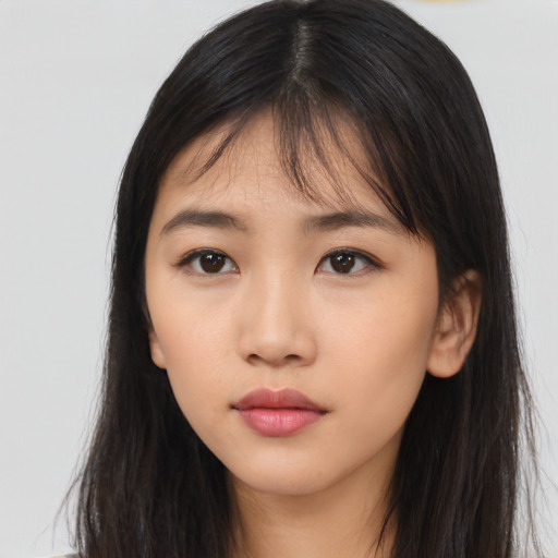 Neutral asian young-adult female with long  brown hair and brown eyes