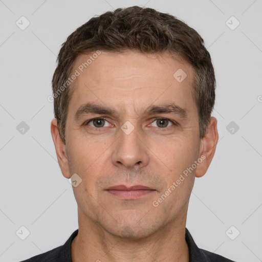 Neutral white adult male with short  brown hair and brown eyes