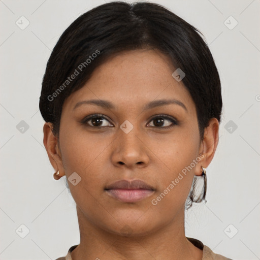 Neutral black young-adult female with short  brown hair and brown eyes