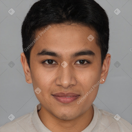 Joyful latino young-adult male with short  brown hair and brown eyes