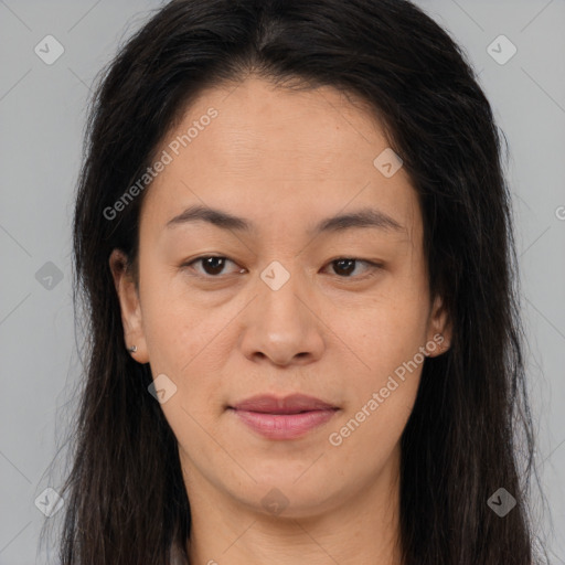 Joyful asian young-adult female with long  brown hair and brown eyes