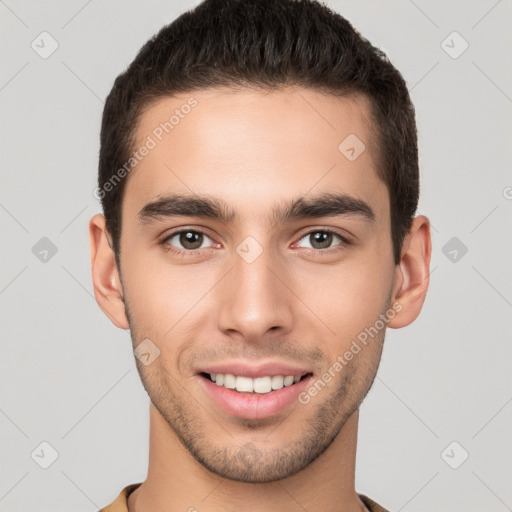 Joyful white young-adult male with short  brown hair and brown eyes