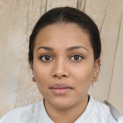 Neutral latino young-adult female with short  brown hair and brown eyes