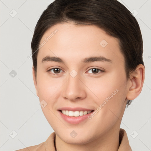 Joyful white young-adult female with short  brown hair and brown eyes