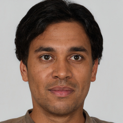 Neutral white adult male with short  brown hair and brown eyes
