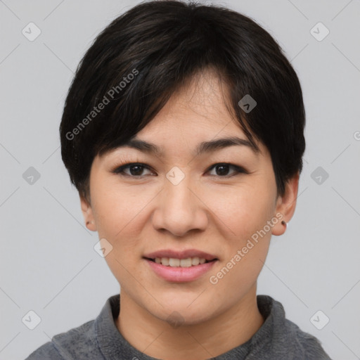 Joyful asian young-adult female with short  black hair and brown eyes