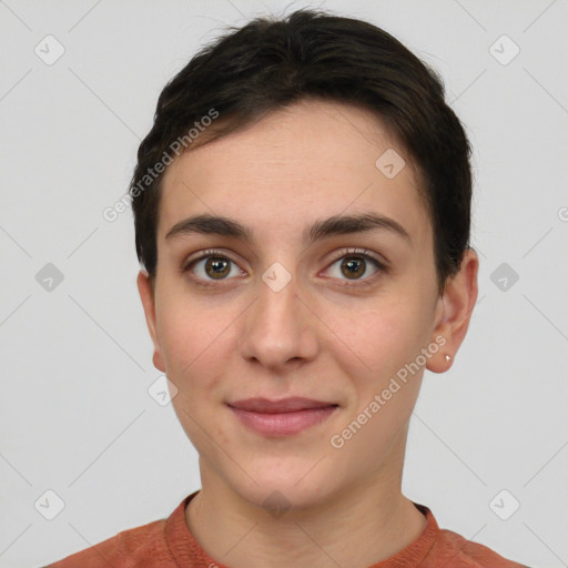 Joyful white young-adult female with short  brown hair and brown eyes