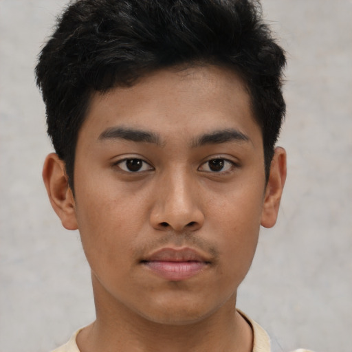 Neutral asian young-adult male with short  brown hair and brown eyes