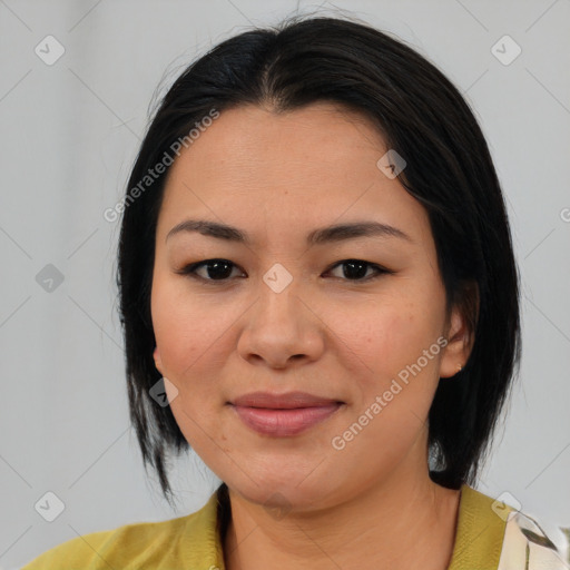 Joyful asian young-adult female with medium  black hair and brown eyes