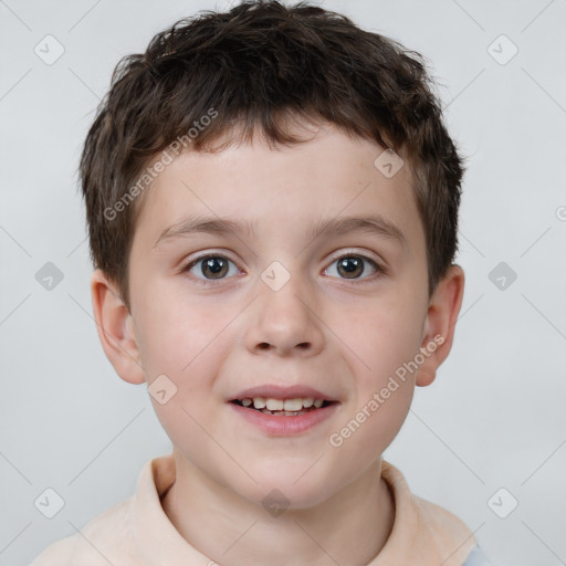 Joyful white child male with short  brown hair and brown eyes