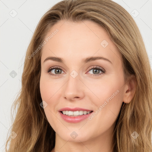 Joyful white young-adult female with long  brown hair and blue eyes