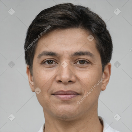 Joyful white adult male with short  brown hair and brown eyes