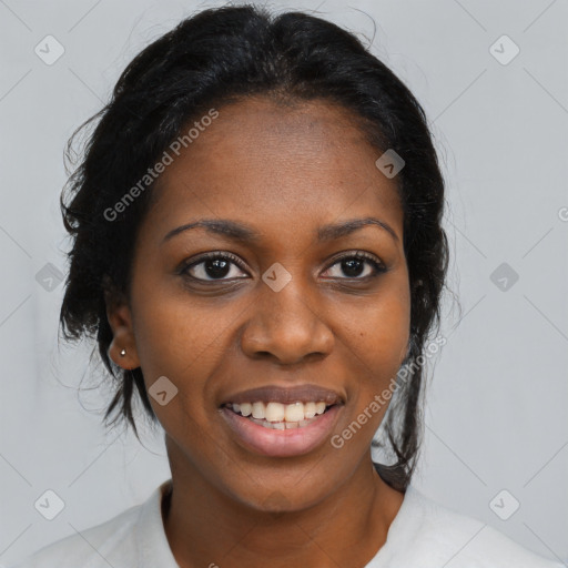 Joyful black young-adult female with medium  black hair and brown eyes