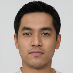 Neutral asian young-adult male with short  black hair and brown eyes