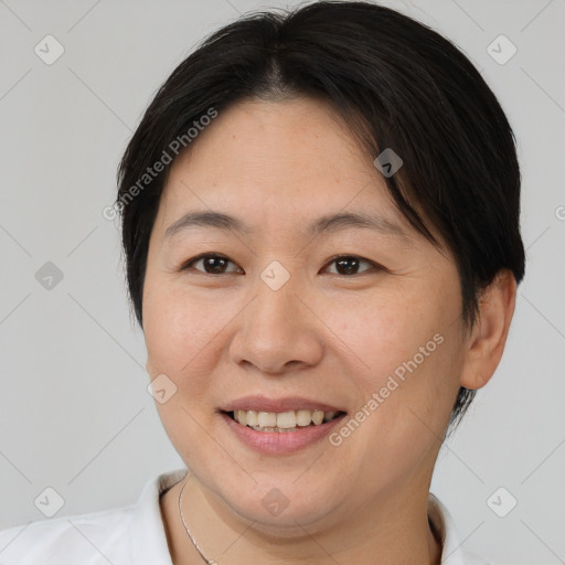 Joyful white young-adult female with short  brown hair and brown eyes