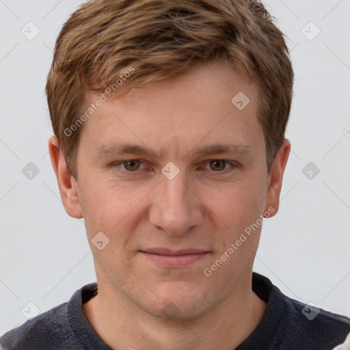 Joyful white adult male with short  brown hair and grey eyes