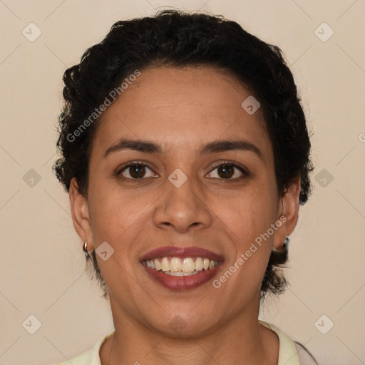 Joyful latino young-adult female with short  brown hair and brown eyes