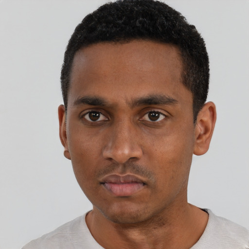 Neutral black young-adult male with short  black hair and brown eyes