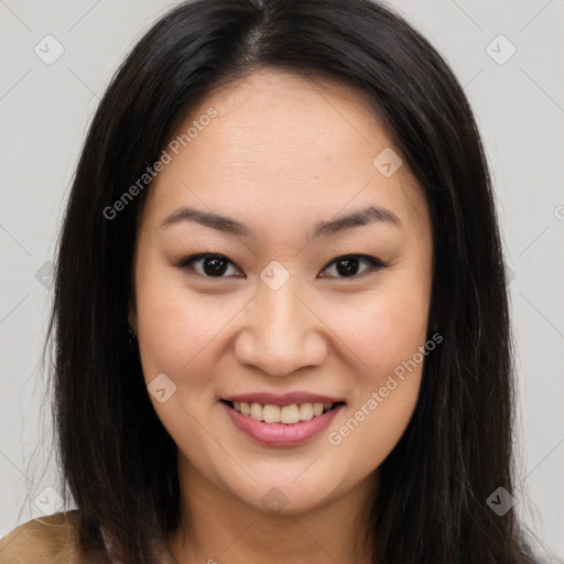 Joyful asian young-adult female with long  brown hair and brown eyes