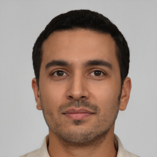 Neutral latino young-adult male with short  black hair and brown eyes