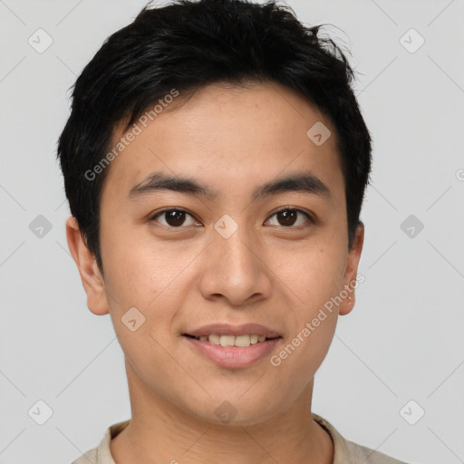 Joyful asian young-adult male with short  brown hair and brown eyes