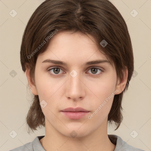 Neutral white young-adult female with medium  brown hair and brown eyes