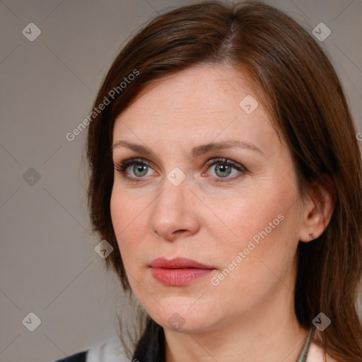 Joyful white adult female with medium  brown hair and brown eyes