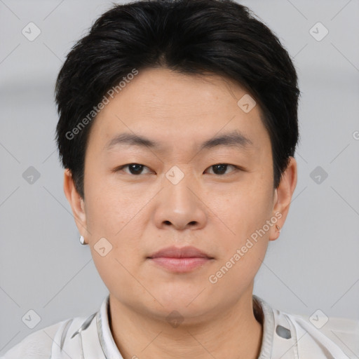 Neutral asian young-adult male with short  brown hair and brown eyes