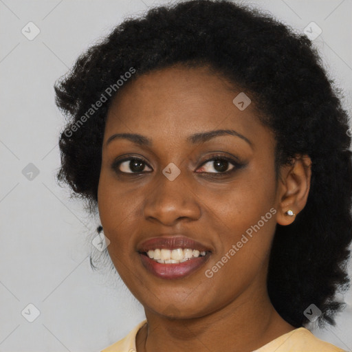 Joyful black young-adult female with medium  black hair and brown eyes